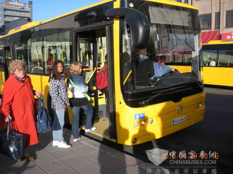 Local citizens get into the Golden Dragon bus