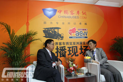 Zhang Jie, Chairman of China Hengtian Group is interviewed (left)