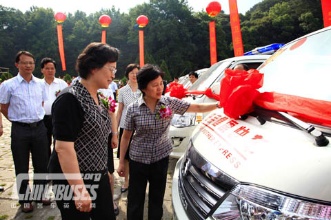 The presented leaders are in the front of Golden Dragon light vans