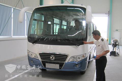 Exported Bus is Being Inspected