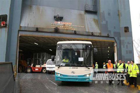 King Long buses drive off deck.