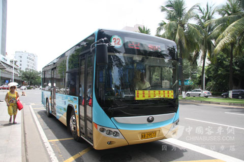The hybrid bus drives in Haikou City.